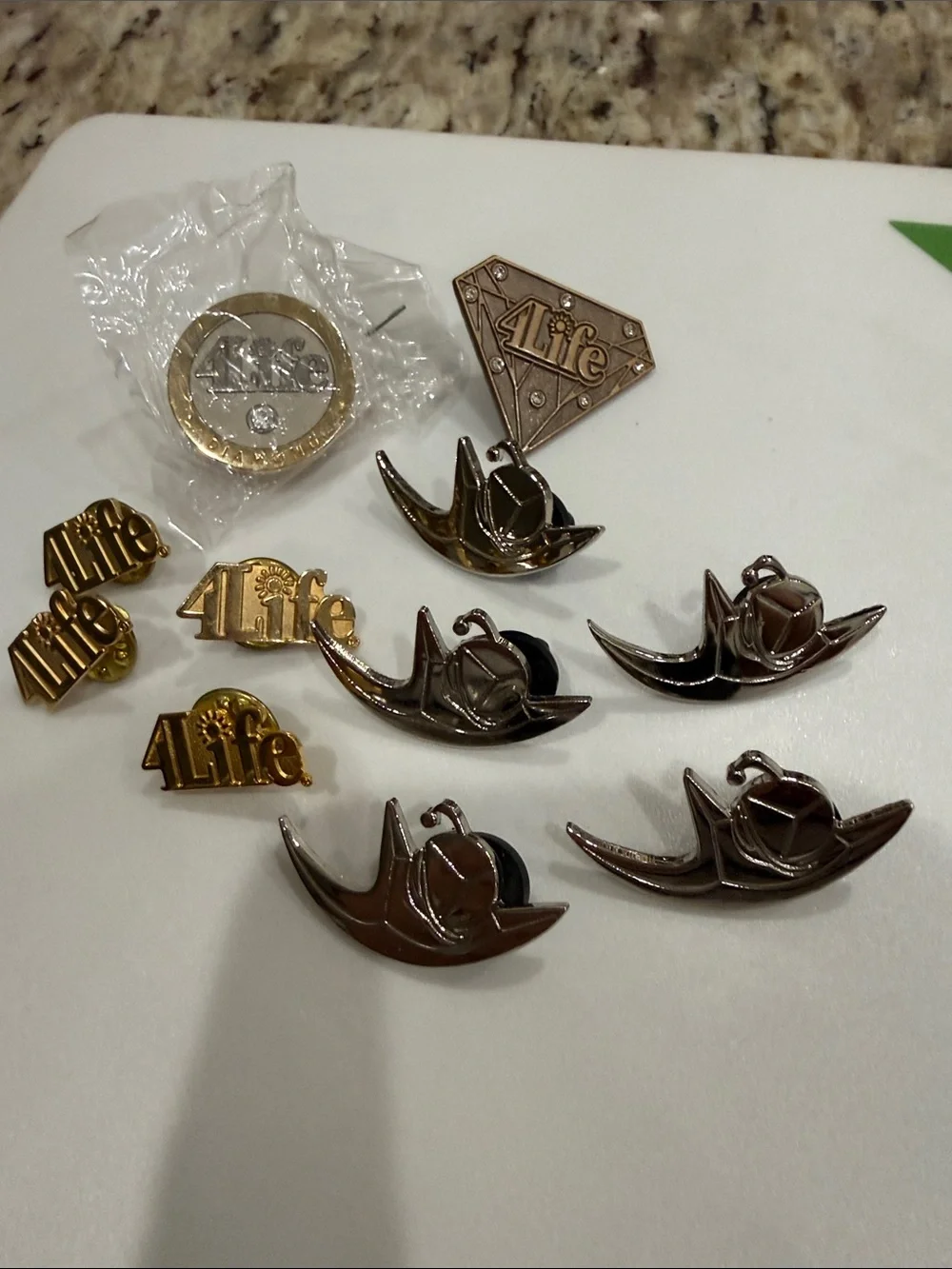 4Life Metal Pins of different ranks in Gold and Silver Accent